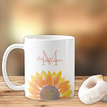 Caneca De Café Monograma de girassol<br><div class="desc">Esta caneca floral é decorada com um girassol de cor amarela e monograma na tipografia do na moda. Facilmente personalizável. Original Watercolor © Michele Davies.</div>