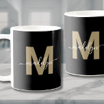 Caneca De Café Monograma de Nome Inicial Dourado Preto<br><div class="desc">Moderno Personalizado Nome Inicial Dourado Glamoroso Negro Monograma Café Mug. Esta caneca na moda combina uma vibração moderna minimalista com um toque glamouroso e pessoal, perfeito para qualquer amante de café ou chá. Apresentando uma inicial dourada em negrito (em matiz castanho quente, achatado e sem brilho) sobre um fundo preto...</div>