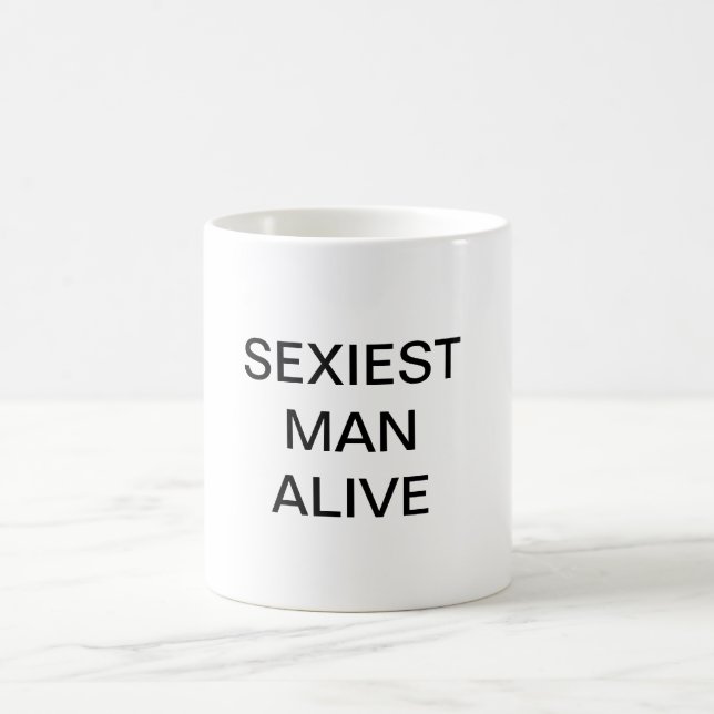 CANECA DE CAFÉ O HOMEM MAIS SEXO VIVO (Centro)