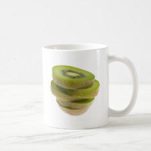 Caneca De Café Pilha de fruta de quivi cortada