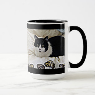Caneca de café preto e branco preciosa do Milo