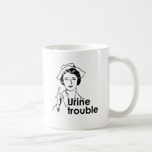 CANECA DE CAFÉ PROBLEMAS URINÁRIOS