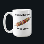 Caneca De Café Shashlik<br><div class="desc">Shashlik is a popular dish in many countries of the Caucasus, Central Asia, and Eastern Europe, but it holds a special place in Georgian cuisine. This delicious skewered meat, often made from marinated chunks of beef, lamb, or pork, is grilled over an open flame, creating a smoky, savory flavor that’s...</div>