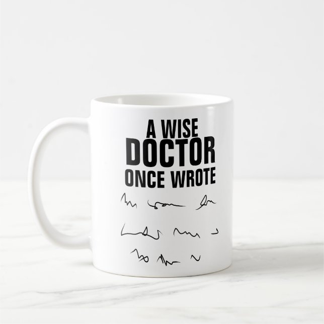 Caneca De Café Um Médico Sábio Uma Vez Escreveu - Engraçado Dizer (Esquerda)