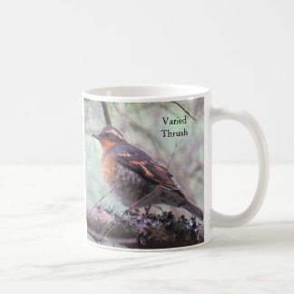Caneca de café variada do tordo