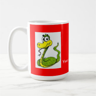 Caneca de café verde e amarela do cobra