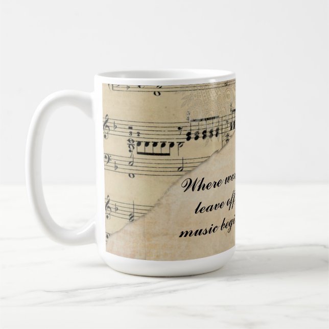 Caneca De Café “Where words leave off, music begins.”  (Esquerda)