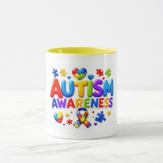 Caneca de conscientização sobre autismo. (Centro)