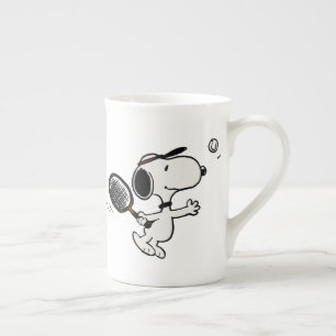 Caneca De Porcelana Amendoins Snoopy Plays Tênis