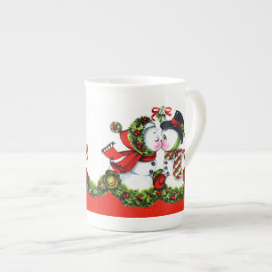 Caneca De Porcelana Beijando o casal do boneco de neve