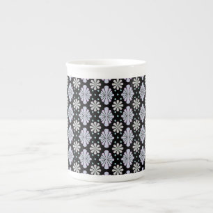 Caneca De Porcelana Formas florais pastéis em um fundo preto