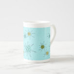 Caneca De Porcelana Robin's Egg Blue Atomic Starbursts China Mug<br><div class="desc">O padrão de Ovo Azul Icônico de Torres Atômicos de Osso China Mug apresenta estrelas atômicas icônicas. Isso mesmo! A antiga escola, o fundo azul de ovo de robin com manchas de ouro é o pano de fundo perfeito para a vibrante turquesa, o aipo de salmoura e os círculos verde...</div>