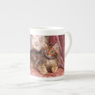 Caneca De Porcelana Wilson Hepple: Gatinho de Brown em uma poltrona