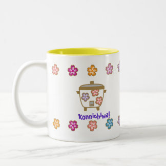 Caneca do fogão de arroz e do pote do chá para