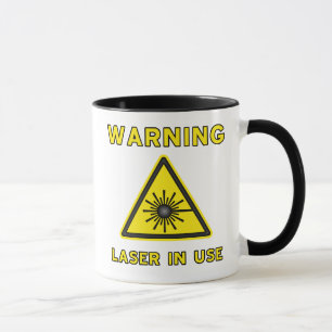 Caneca do símbolo de advertência de laser
