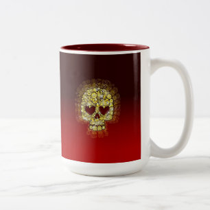 Caneca dourada do crânio