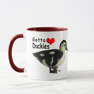 Caneca É preciso amar os patinhos