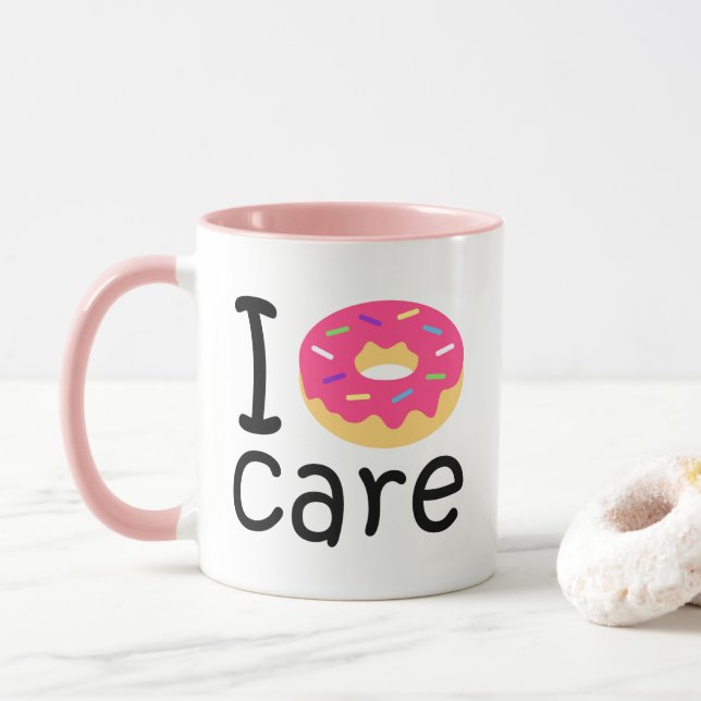Caneca Emoji engraçado das citações da frase do cuidado (Com Donut)