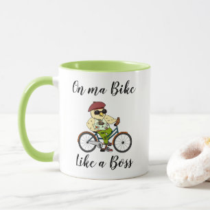 Caneca engraçada do ciclismo com um pássaro à moda