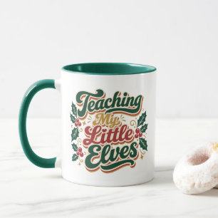 Caneca Ensinando Meus Pequenos Elfos Professor de Natal