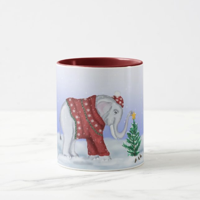 Caneca feita malha da camisola do elefante à (Centro)