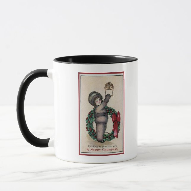 Caneca Feliz natalinoKid batendo com uma coroa (Esquerda)