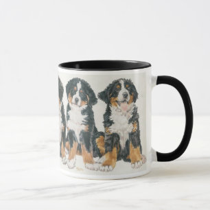 Caneca Filhotes de cachorro do cão de montanha de Bernes