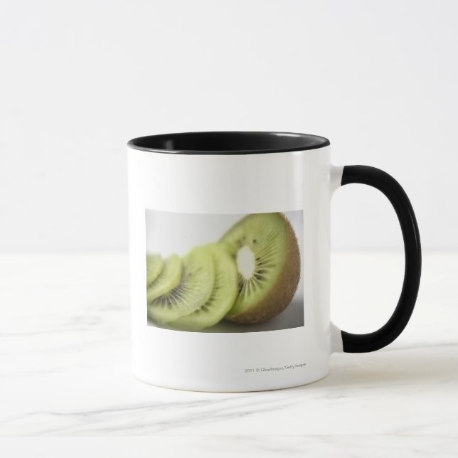 Caneca Fim-acima de fatias do quivi (Direita)
