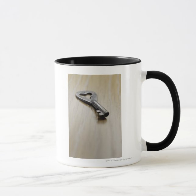 Caneca Fim-acima de uma chave (Direita)