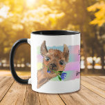 Caneca Funny Llama Mia Mug<br><div class="desc">Deixe todos no escritório saberem como está indo com esta linda caneca de lama. Uma pequena lhama marrom segura uma flor azul na boca contra um fundo de abstrato de água pastel. A imagem é impressa em dois lados da caneca, com o texto no meio que diz "LLAMA MIA Here...</div>