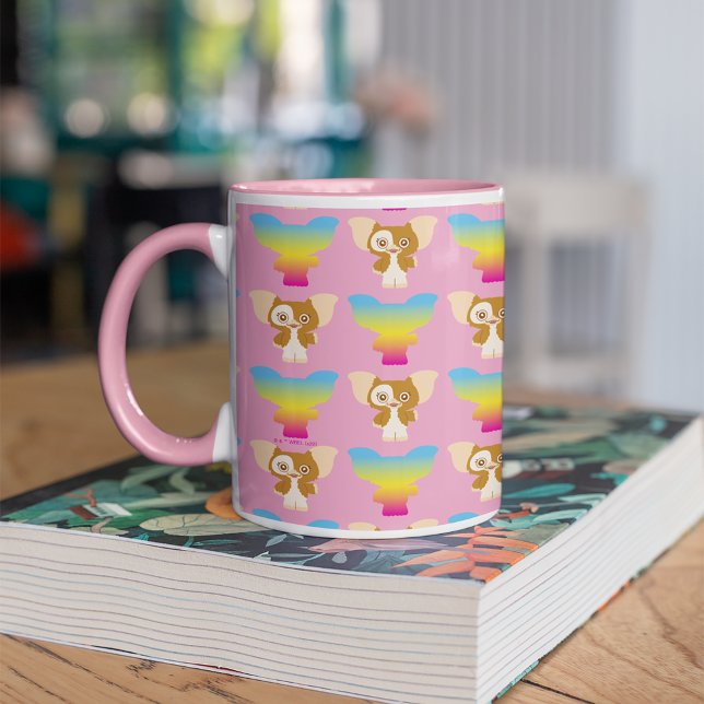 Caneca Gizmo | Padrão do arco-íris (Mug on book)