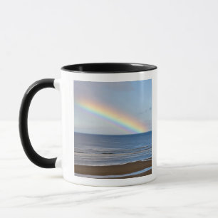 Caneca Grande arco-íris sobre o Oceano Pacífico em