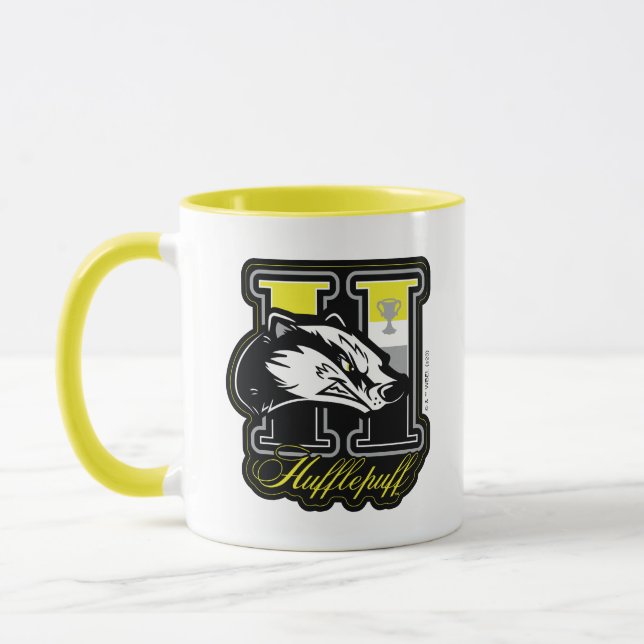 Caneca HARRY POTTER™ | Crachá atlético HUFFLUFF™ (Esquerda)