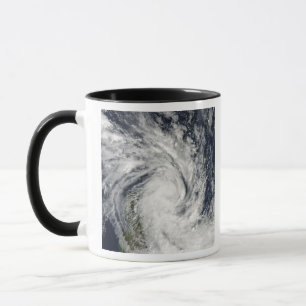 Caneca Jade tropical da tempestade que vem em terra sobre