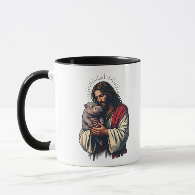 Caneca Jesus segurando um bebê Moo Deng Hippo (Esquerda)