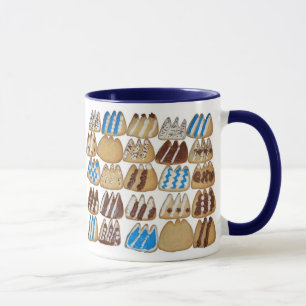 Caneca Lama do café com biscoitos cozidos