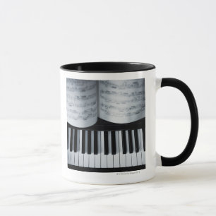 Caneca Livro das chaves e de música do piano