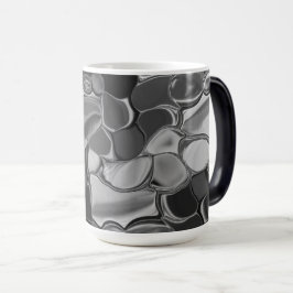 Caneca Mágica Cinzas claras e formas arredondadas escuras.