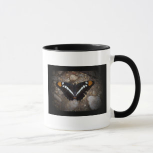 Caneca manchada branco da borboleta