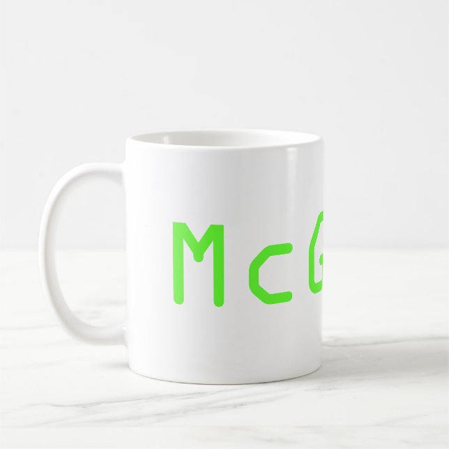Caneca McGeek do programa televisivo de NCIS (Esquerda)