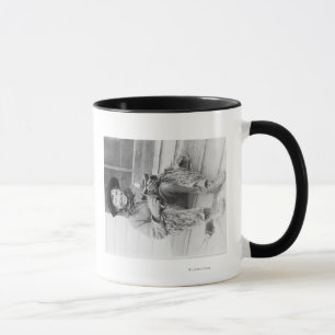 Caneca Menino novo vestido como o vaqueiro com brinquedos