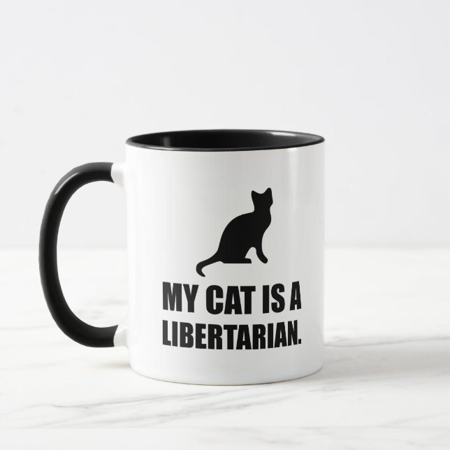 Caneca Meu gato é um político engraçado do libertário (Esquerda)