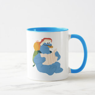 Caneca Monstro De Cookies Lendo Um Mapa