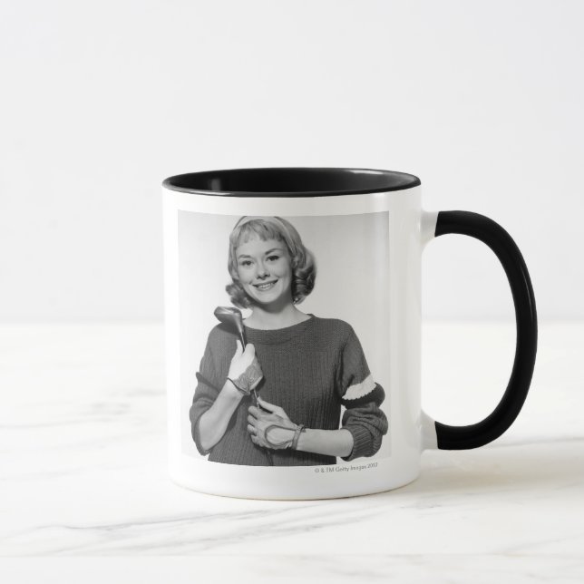Caneca Mulher que guardara o clube de golfe (Direita)