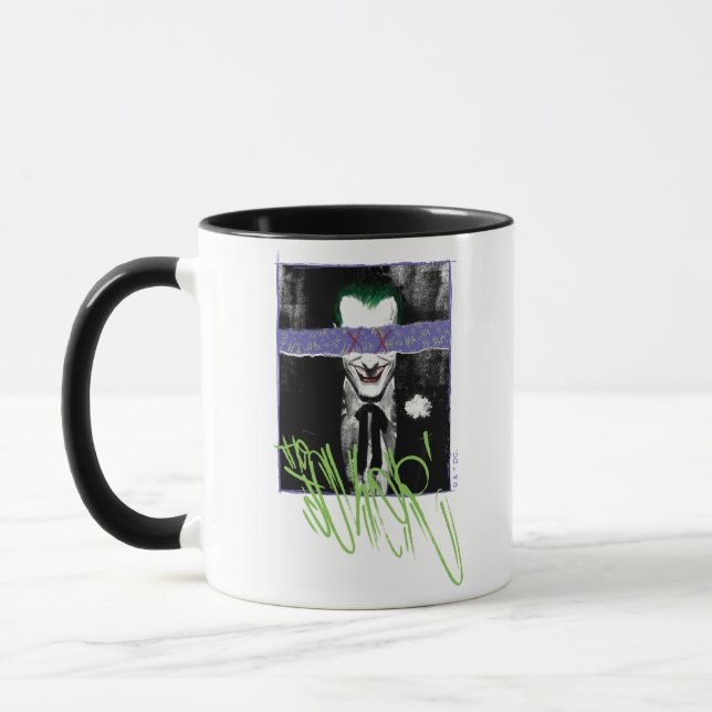 Caneca O Álbum de Recortes do Coringa Fotografia (Esquerda)