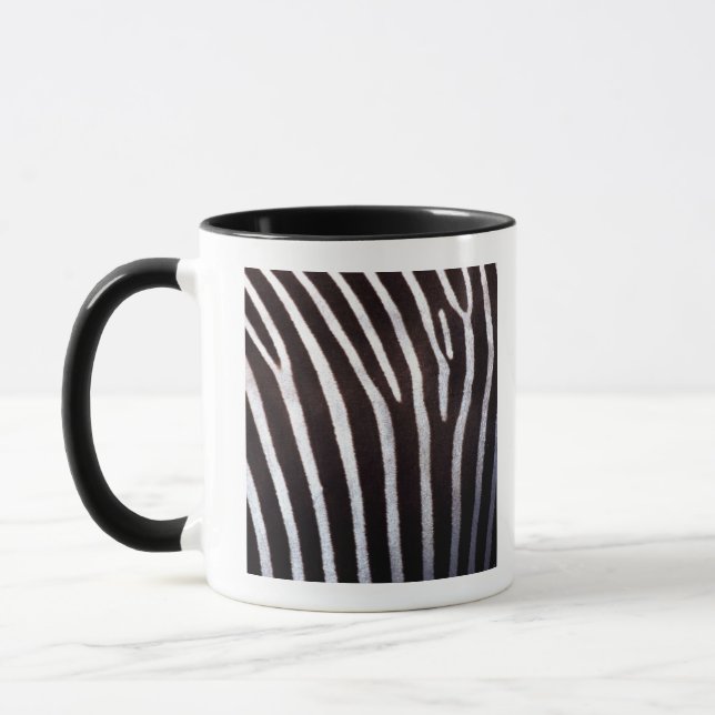 Caneca o couro cru da zebra (Esquerda)