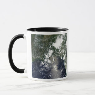 Caneca O óleo espalha para o nordeste