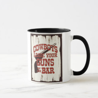 Caneca Os vaqueiros verificam suas armas