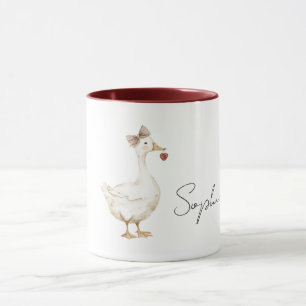 Caneca Pato Creme Laço Coração Vermelho