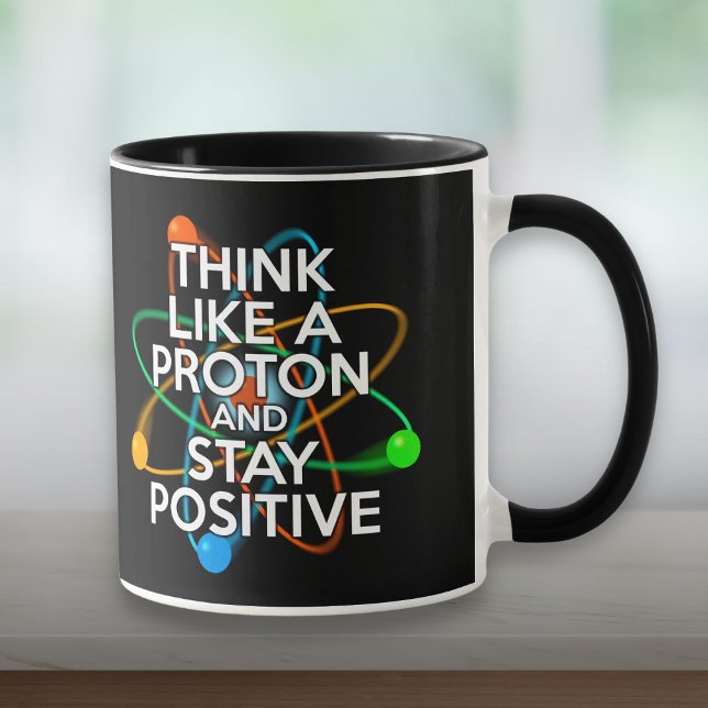 CANECA PENSE COMO UMA PROTON E FIQUE POSITIVO (THINK LIKE A PROTON AND STAY POSITIVE MUG)